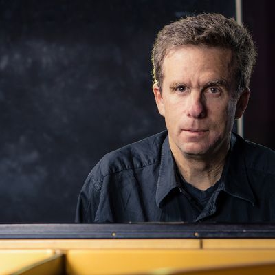 man looking at camera wearing black shirt